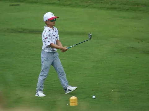 a man playing golf