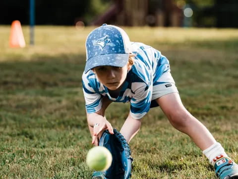 a child playing with a ball