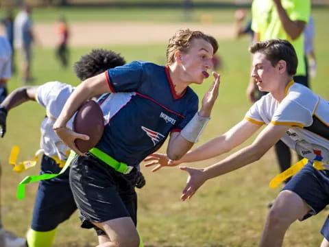 a group of men playing rugby
