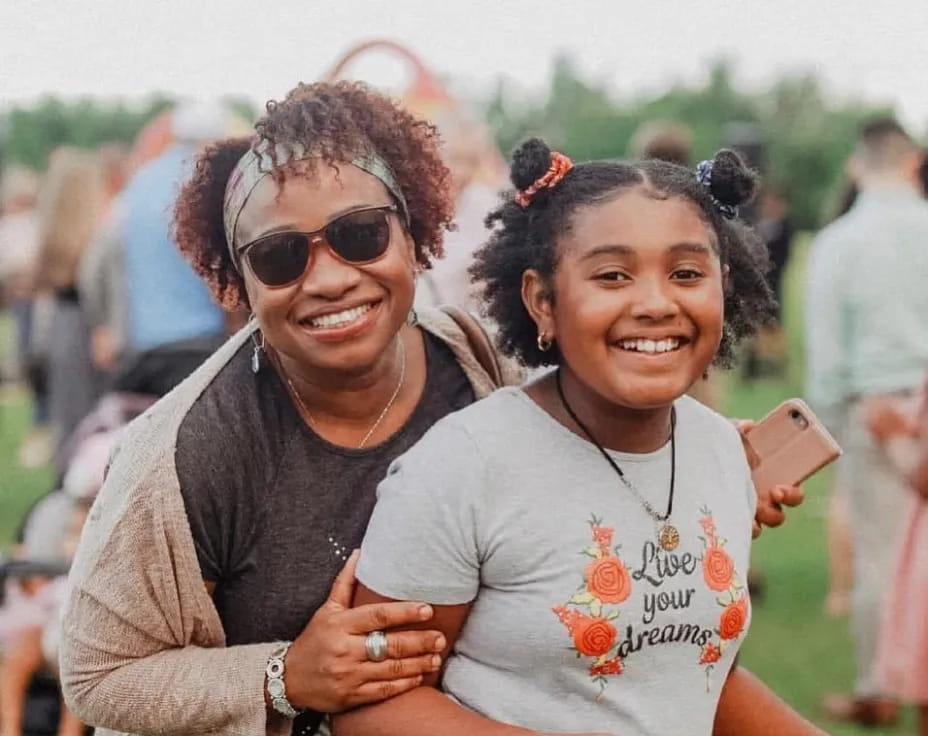 a man and a woman smiling
