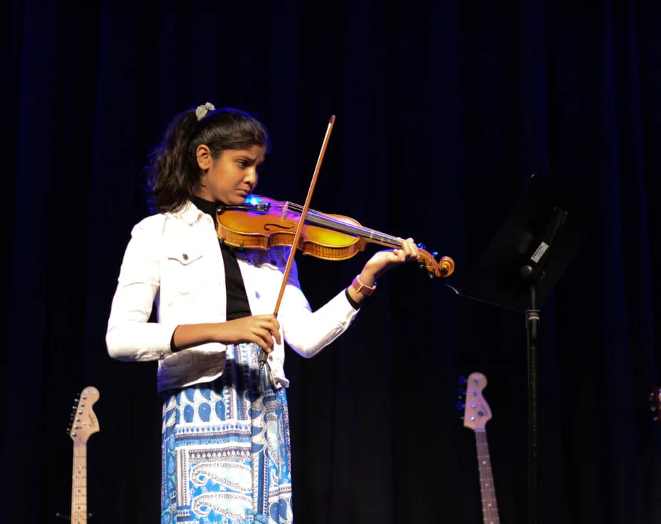 a person playing a violin