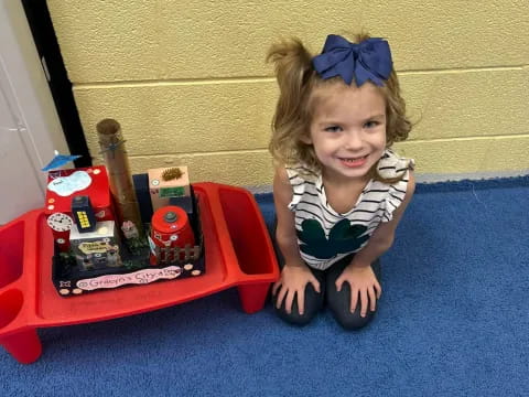 a child sitting on the floor