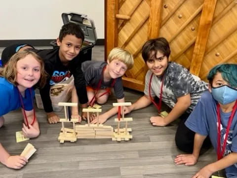 a group of people wearing masks