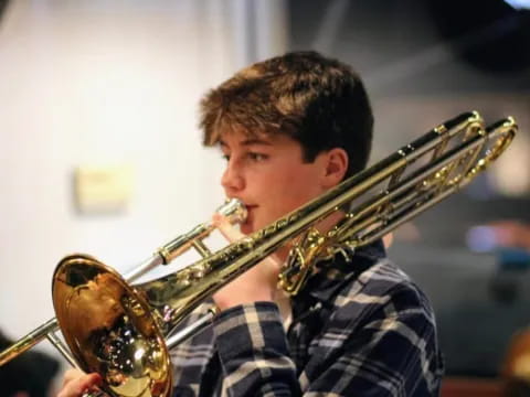 a man playing a trumpet