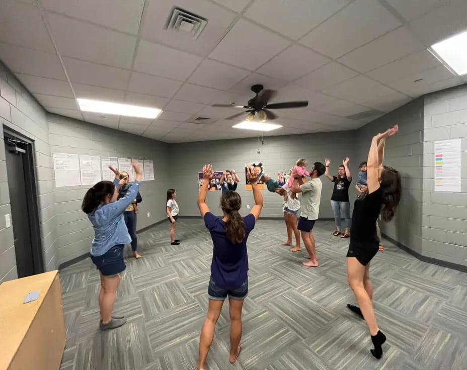 a group of people in a room