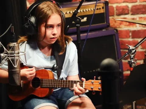 a person playing a guitar