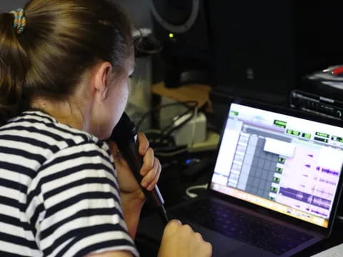 a woman using a laptop