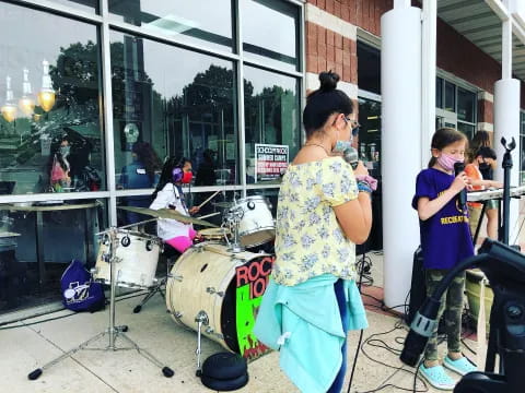 a person playing drums