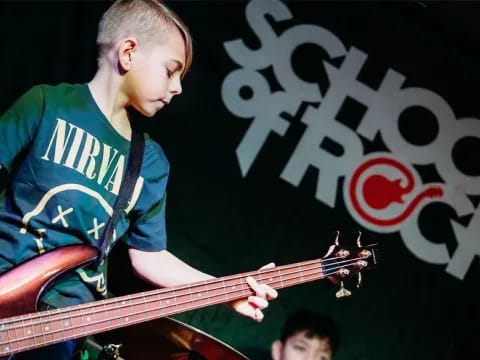 a person playing a guitar