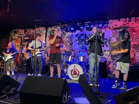 a group of people on a stage