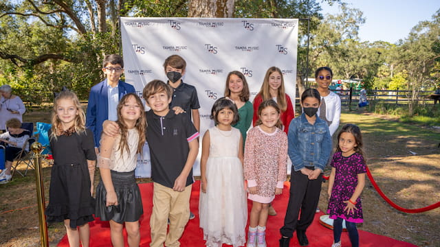 a group of people posing for a photo