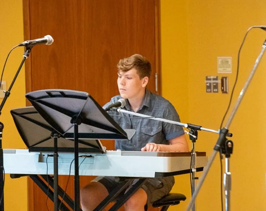 a person playing a piano