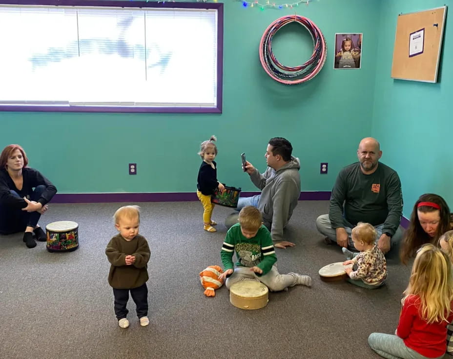 a group of people sitting in a room