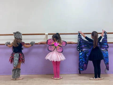 a group of women in dresses
