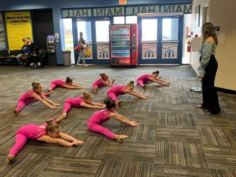 a group of people doing yoga