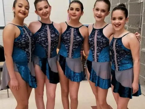 a group of women in swimsuits