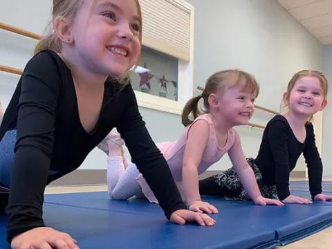 a woman and two girls