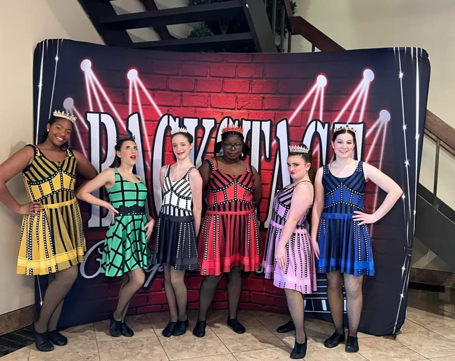 a group of women in clothing