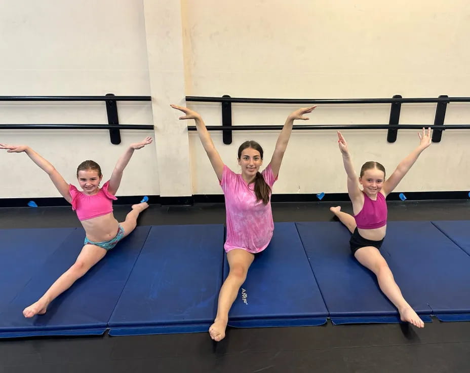 a group of girls posing for a photo