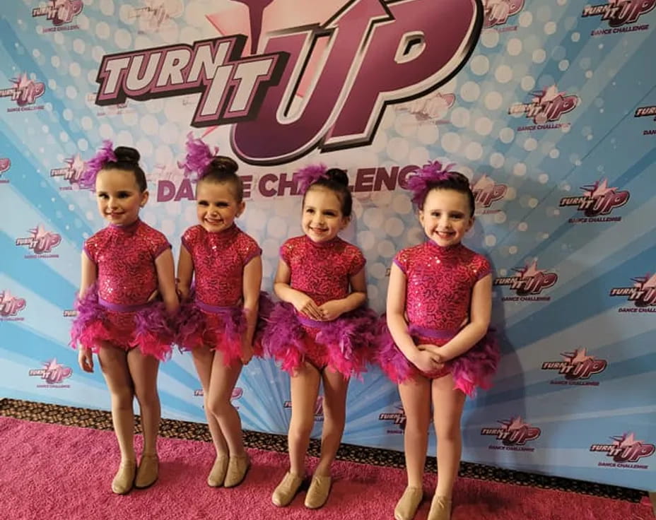 a group of girls in clothing