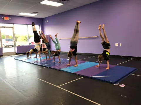 a group of people doing yoga
