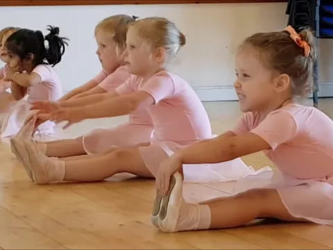 a group of girls in a circle