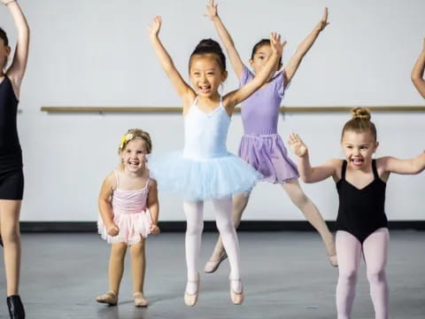 a group of girls dancing