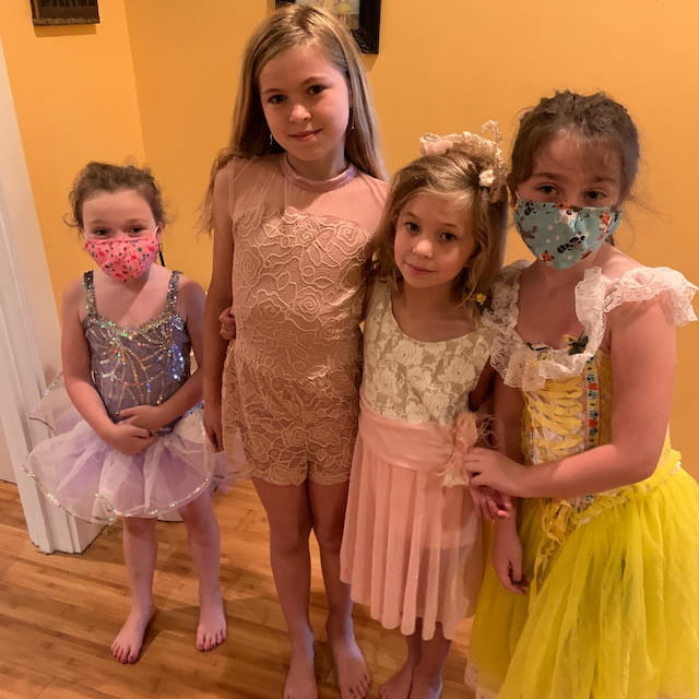 a group of girls posing for a photo