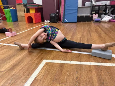 a person doing a plank on a mat