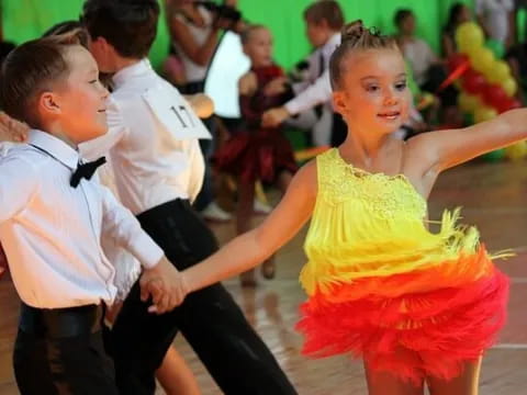 a group of children dancing