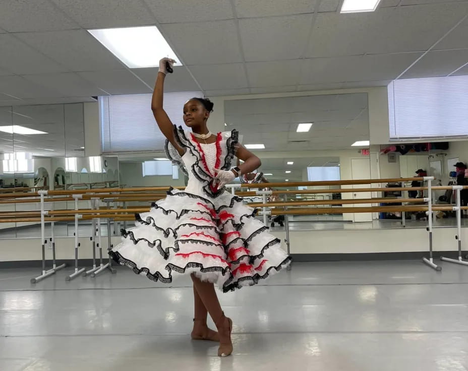 a person in a dress dancing