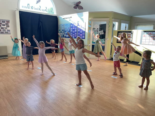 a group of children dancing