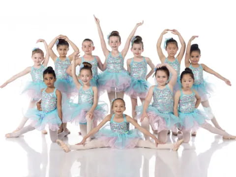a group of women in dresses