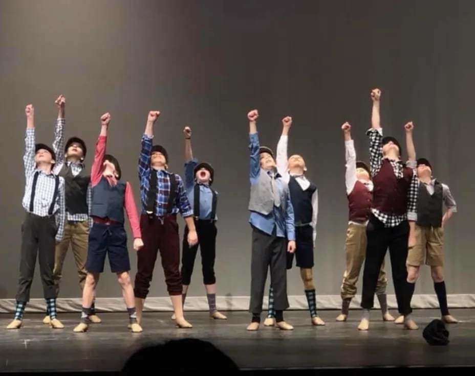 a group of people on a stage