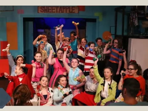 a group of children in clothing