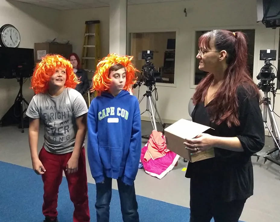 a woman and two children