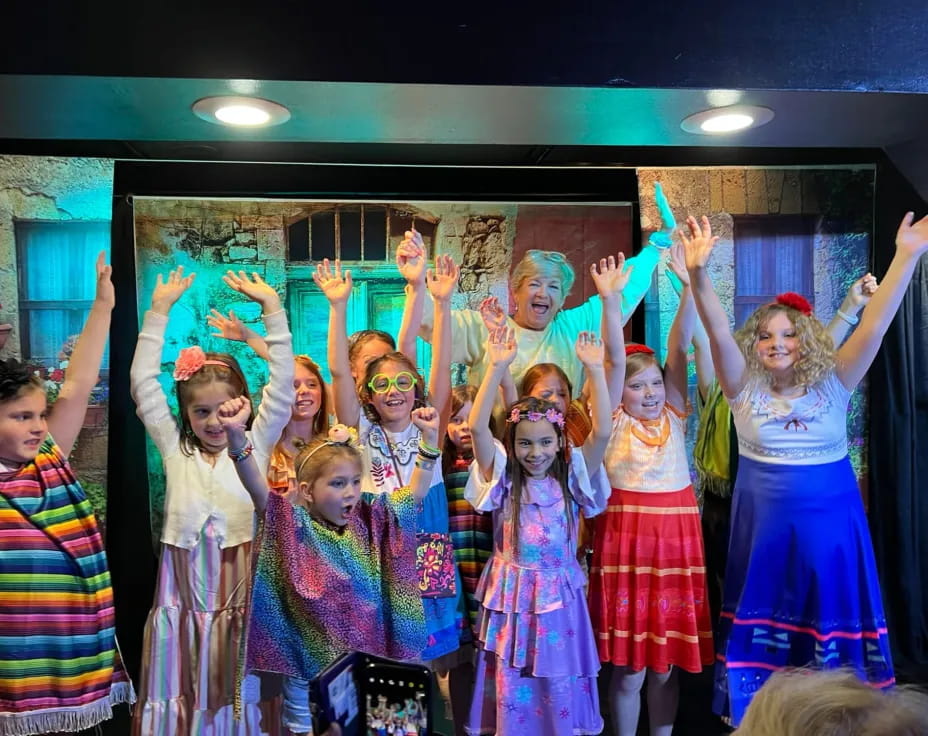 a group of children in clothing