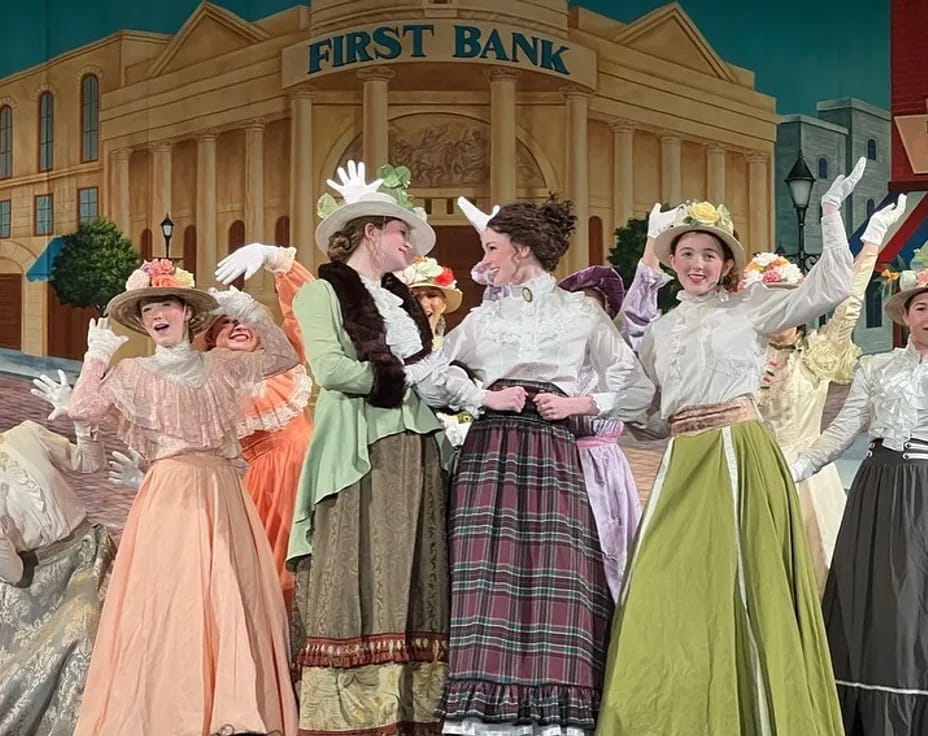 a group of women in clothing