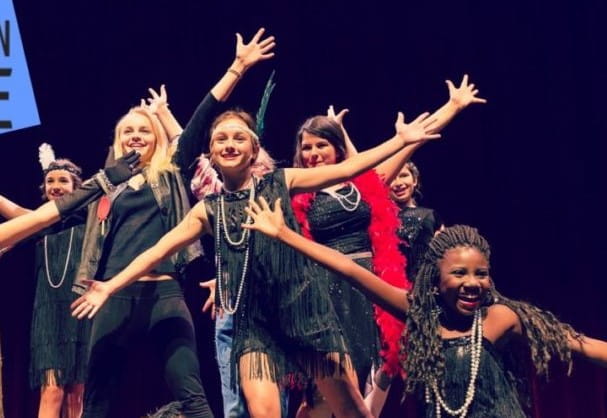 a group of people on a stage