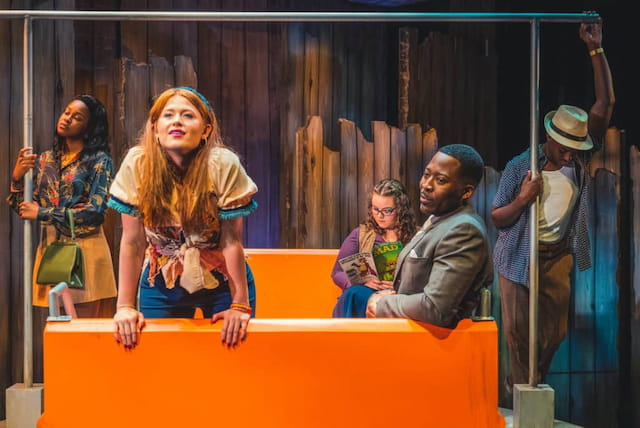 a group of people on a stage