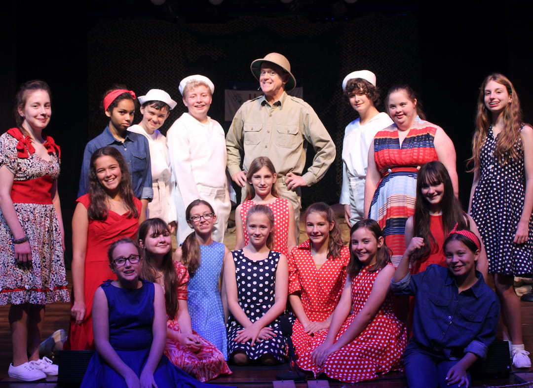 a group of people posing for a photo