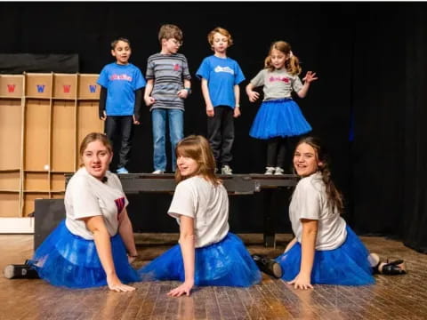 a group of children on a stage