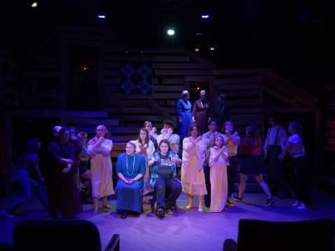 a group of people on a stage