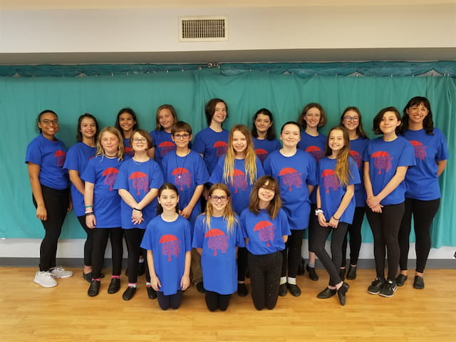 a group of people posing for a photo