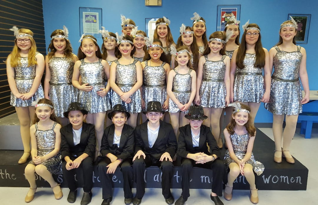 a group of people posing for a photo