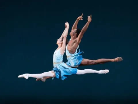 a couple of people dancing