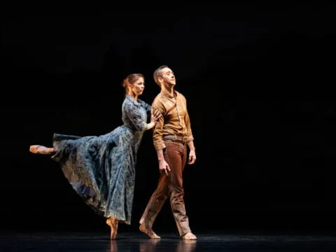 a man and woman dancing