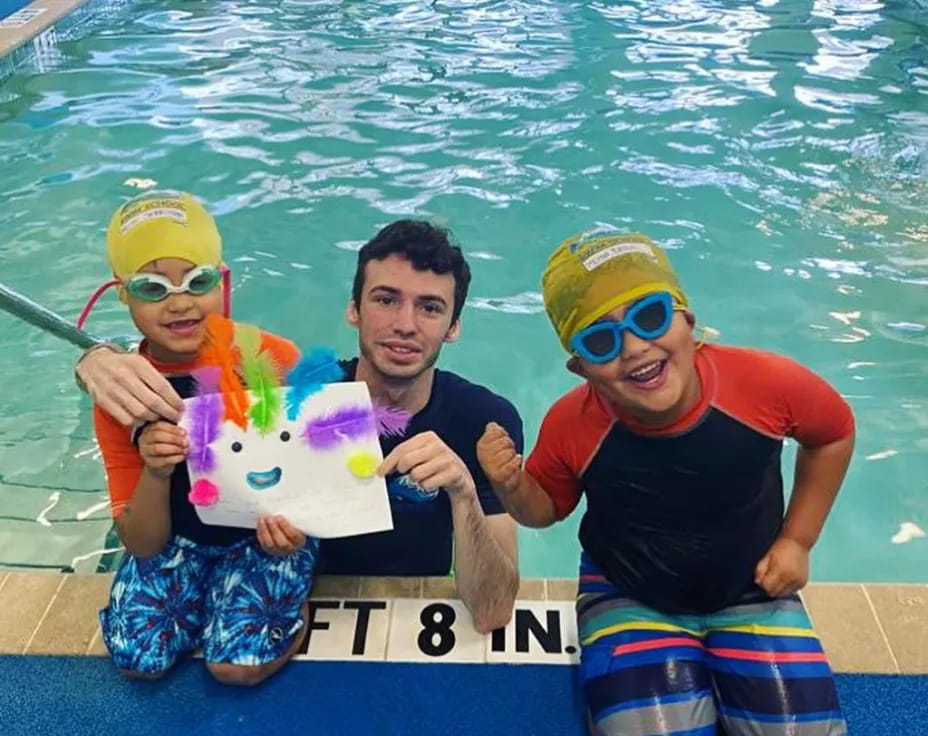 a group of people in a pool