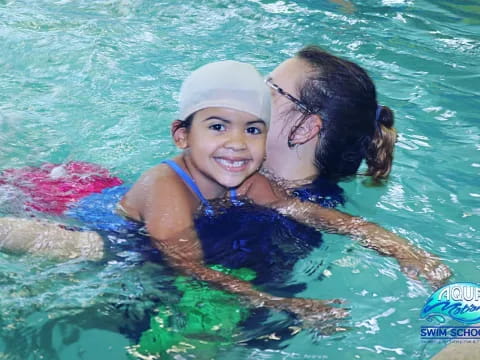 a person and a child in the water