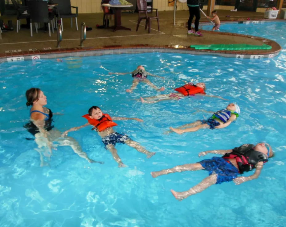 a group of people in a pool